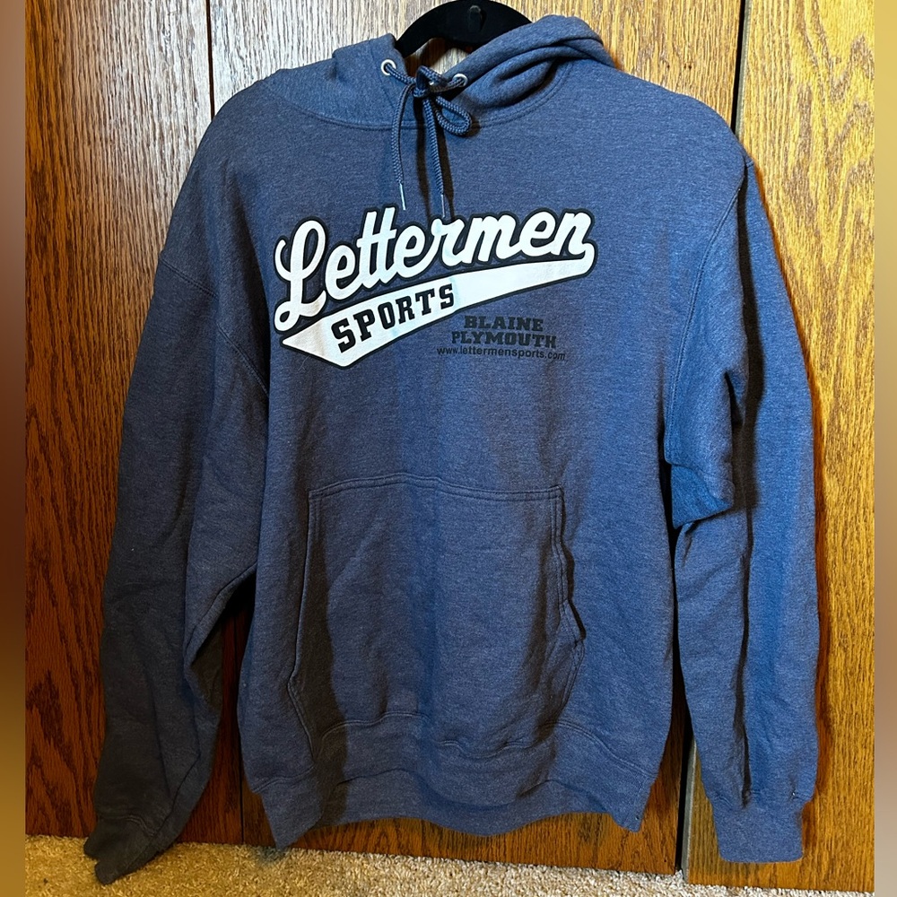 Navy blue letterman’s hoodie size large.